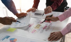 a business team working to improve business processes