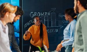 Founders discussing growing with purpose-driven leadership and EOS business scaling frameworks