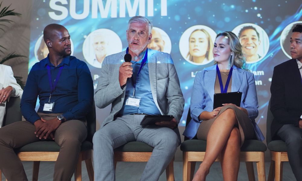 Leadership team at corporate business summit.